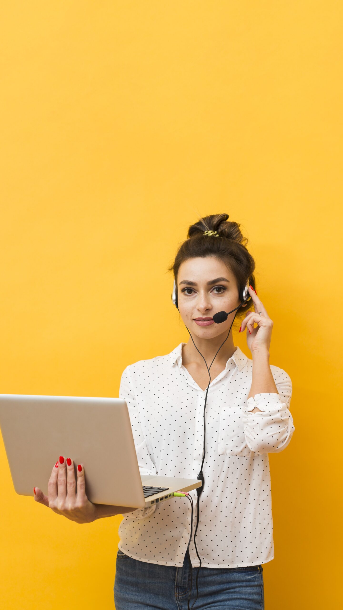 front-view-woman-holding-laptop-ready-take-calls-headset